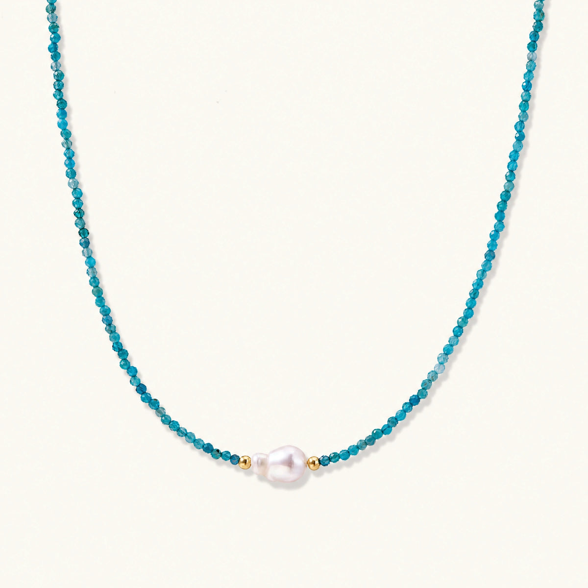 Blue apatite beaded necklace with a single freshwater pearl in the centre