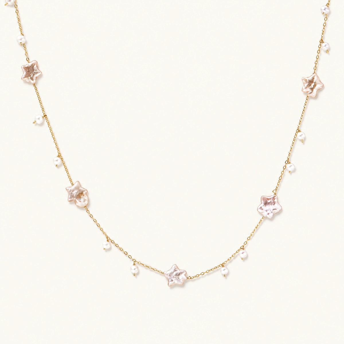 Vermeil chain with star-shaped baroque pearls and small round freshwater pearl drops