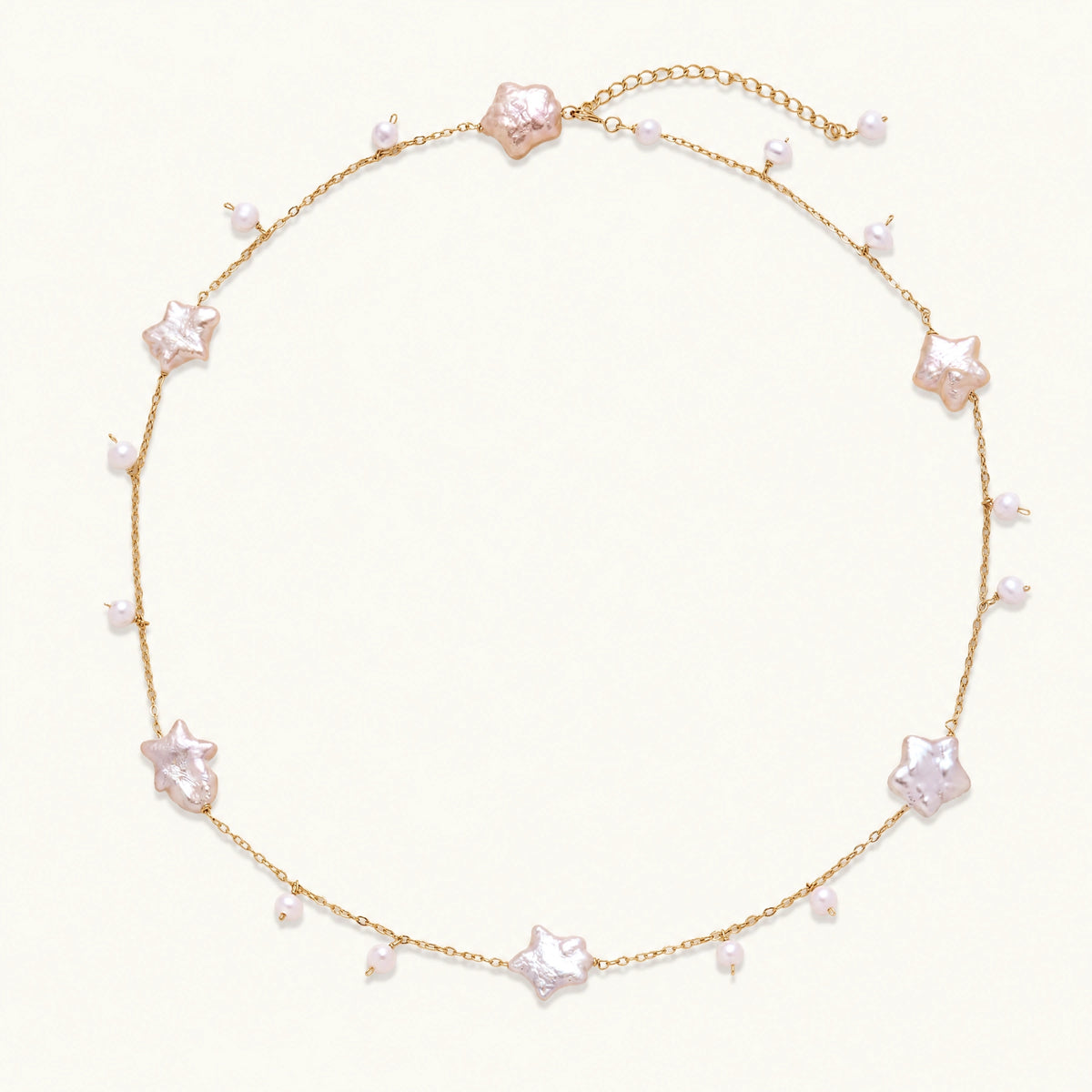Vermeil chain with star-shaped baroque pearls and small round freshwater pearl drops
