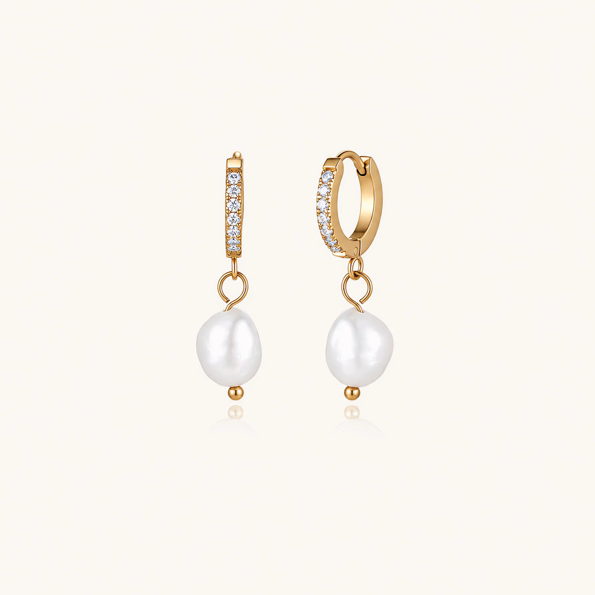 Pearl Drop Hoops: Sparkling huggie hoops with a freshwater pearl hanging from each one