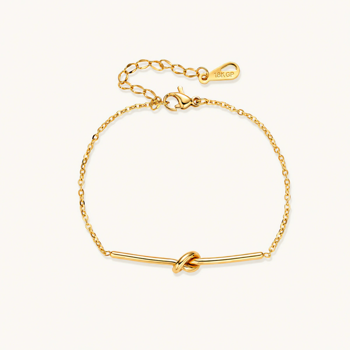 Twisted Knot Bar Bracelet: A slim bar with a knot at its centre, on a fine adjustable chain