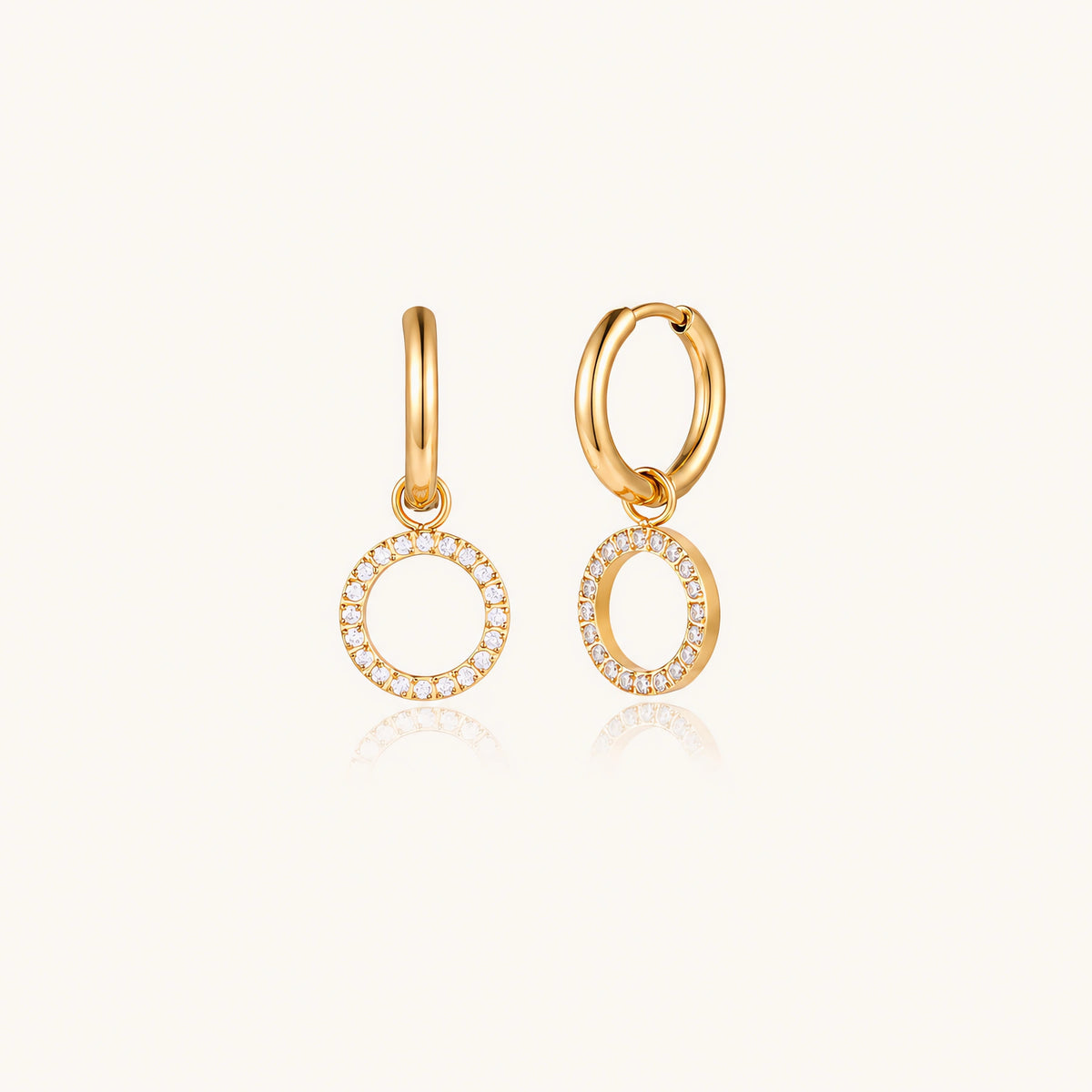 Halo Circle Hoops: Huggie hoops with a small circle charm set with tiny cubic zirconia stones
