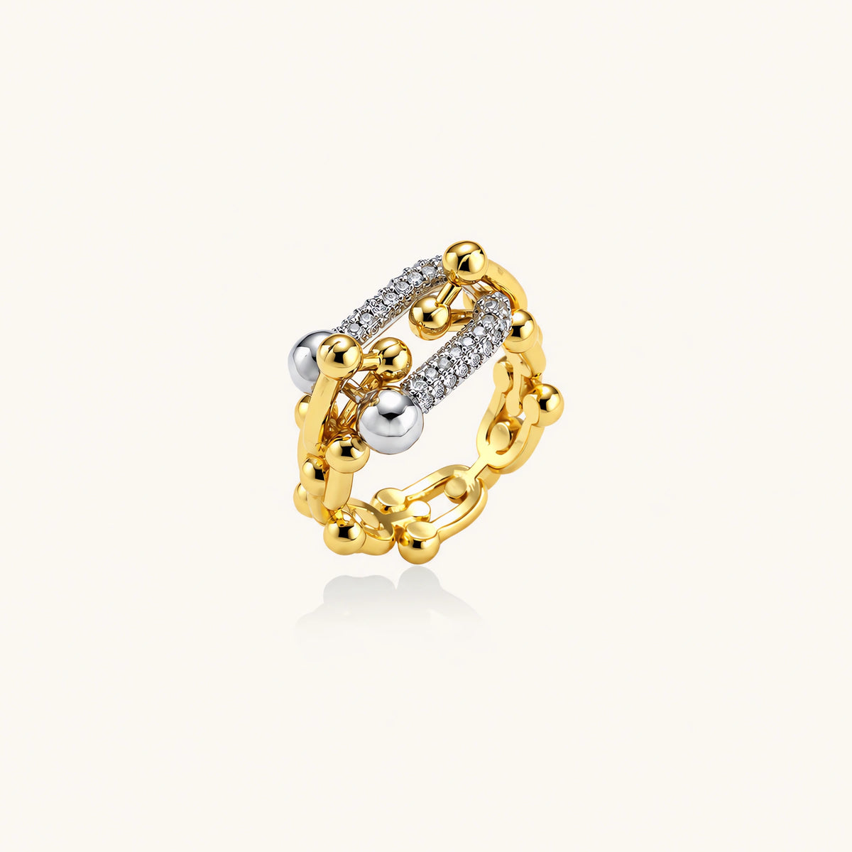 Chain Link Power Ring: polished spheres and sparkling cubic zirconia across three joined bands