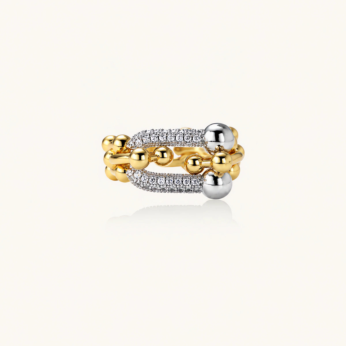 Chain Link Power Ring: polished spheres and sparkling cubic zirconia across three joined bands