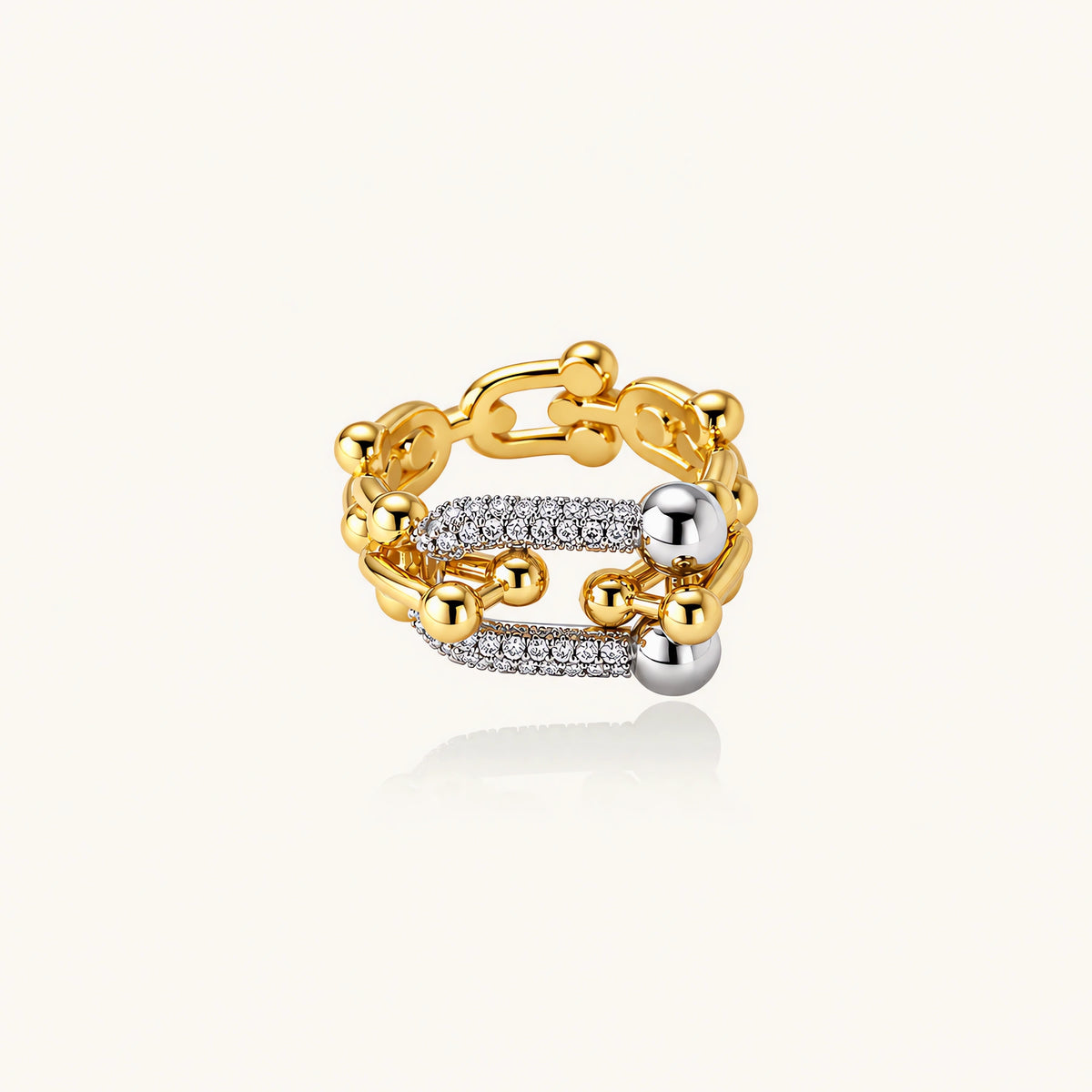 Chain Link Power Ring: polished spheres and sparkling cubic zirconia across three joined bands