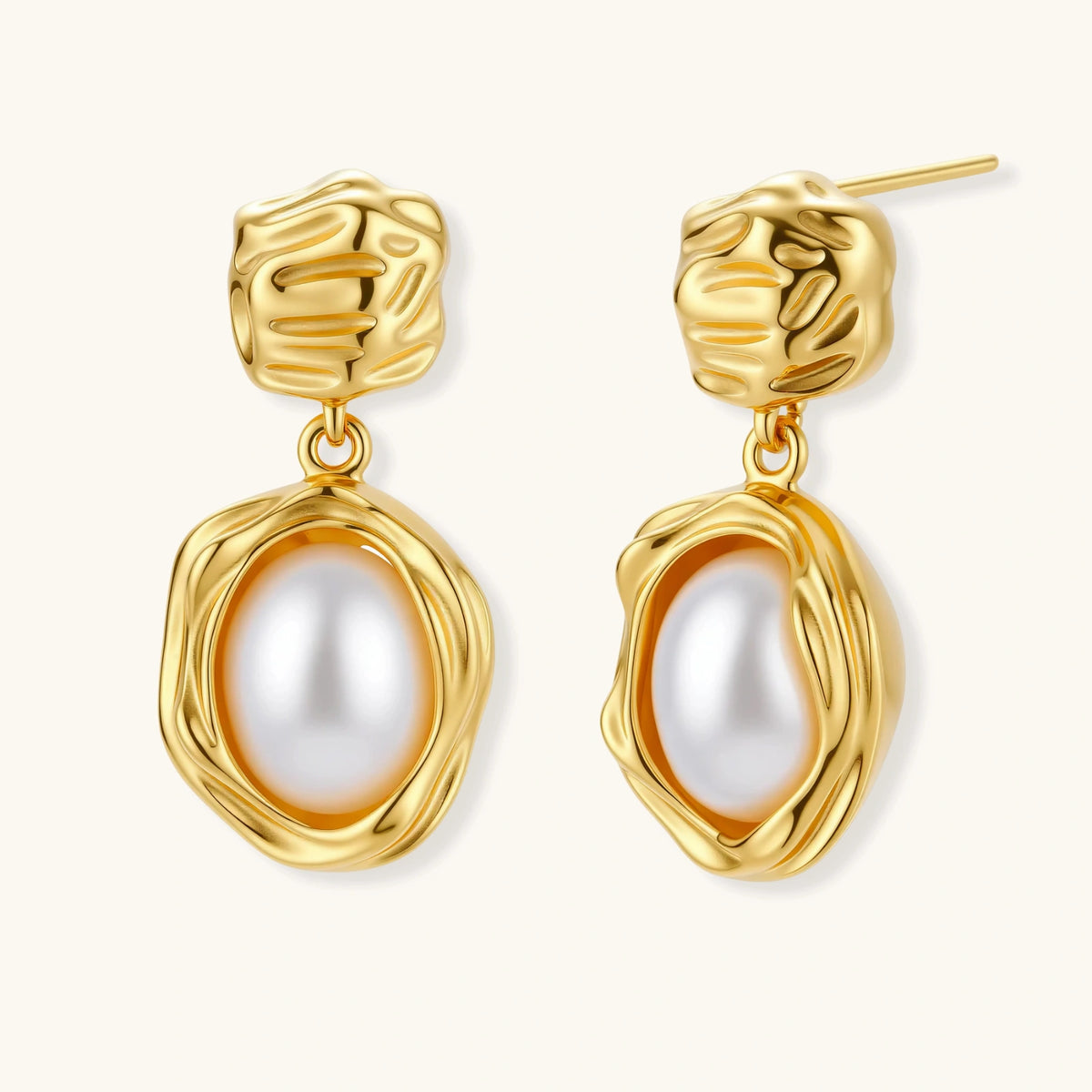 Bloom Pearl Drops: Textured flower-shaped studs with a freshwater pearl drop below