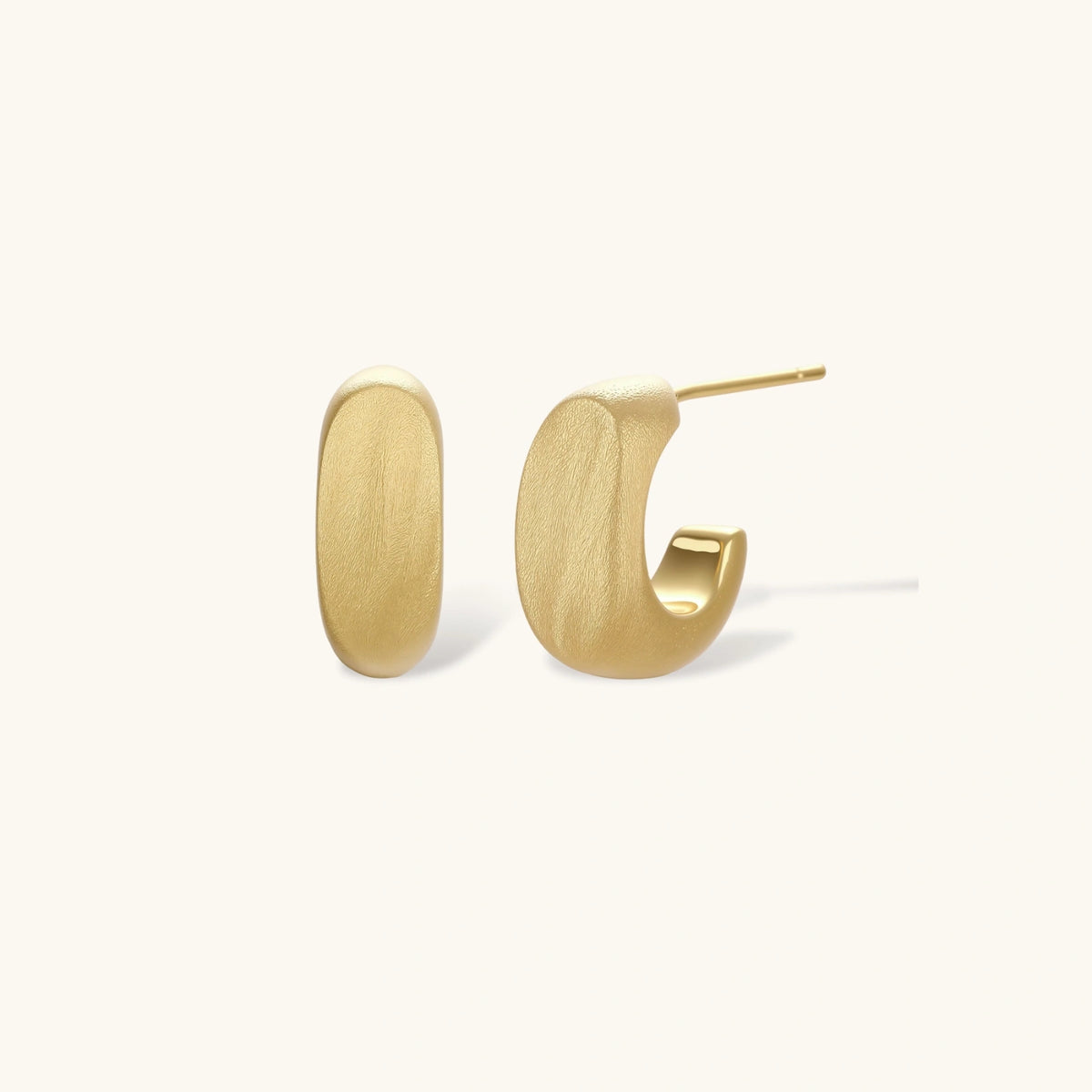 Daily Glow Huggies: Smooth, minimal huggie hoops that sit close to the ear